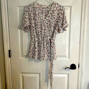 Fancy shirt with tie on left side of hip